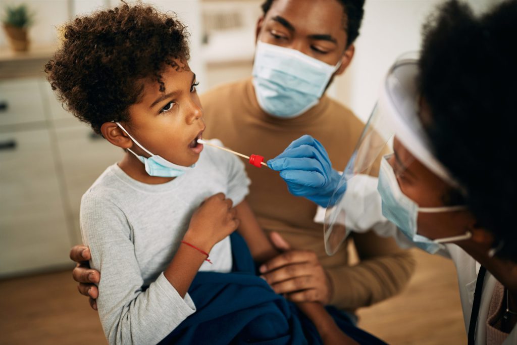 small-black-boy-having-pcr-test-home-during-coronavirus-pandemic-scaled.jpg